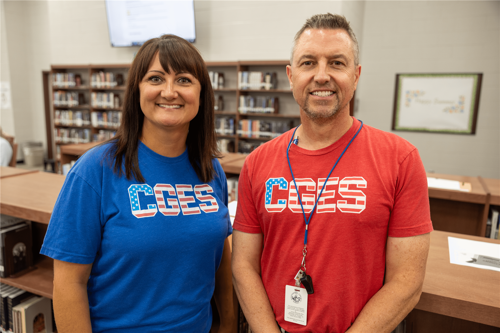 Principal and Assistant Principal smiling